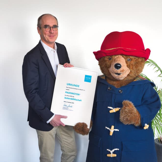 Paddington übernimmt UNICEF-SchirmBÄRschaft 
