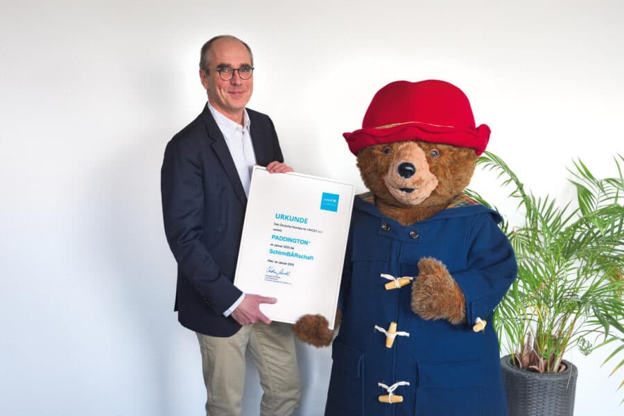 Paddington übernimmt UNICEF-SchirmBÄRschaft 